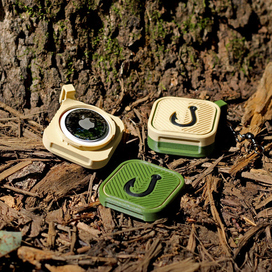 Fishing AirTag keychain case with twist lock lid and raised hook design